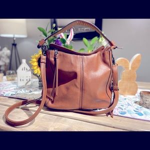 Off brand fux leather crossbody or shoulder bag.